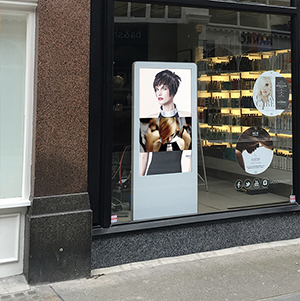 digital signage screen white window shop retail