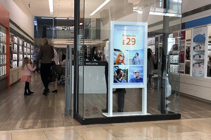 Freestanding Ultra High Brightness Digital Poster in the window display of an opticians 