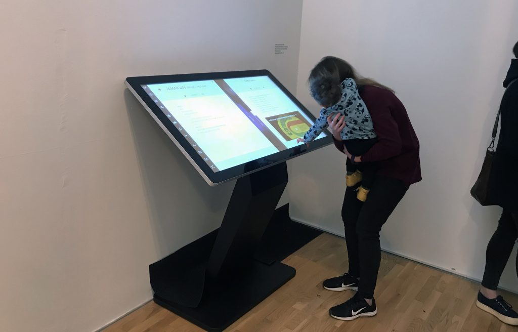 Exhibition visitors using a PCAP Touch Screen Kiosk