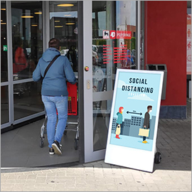 Outdoor Battery A-Board used as a COVID-19 solution outside a retail supermarket store
